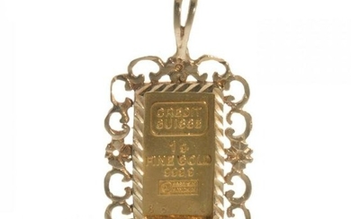Gold ingot. With frame for use as a pendant. Weight: 2.4 g.