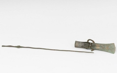 Grill ax and skewer; Roman age. Bronze.