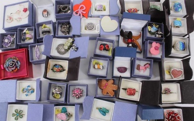 Group of contemporary gem and paste set costume rings including a Butler & Wilson flower ring in box and other costume jewellery