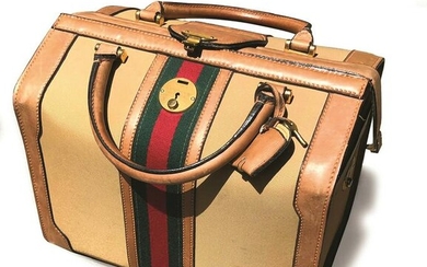 Gucci, a canvas and leather beauty case