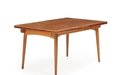 SOLD. Hans J. Wegner: "AT 312". A dining table with Dutch extension, oak frame and teak top. Manufactured by Andreas Tuck. – Bruun Rasmussen Auctioneers of Fine Art