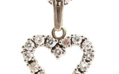 Heart shaped diamond pendant set with numerous single-cut diamonds, mounted in 14k white gold. L. 1.9 cm. A 14k white gold necklace included. L. 42 cm.