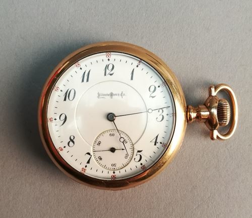 ILLINOIS WATCH & CO. Gold-plated metal pocket watch...