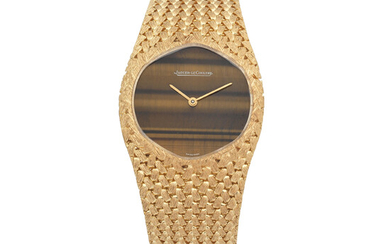 Jaeger-LeCoultre. An 18K gold manual wind bracelet watch with tiger's eye dial Ref 19085 21, Circa 1970