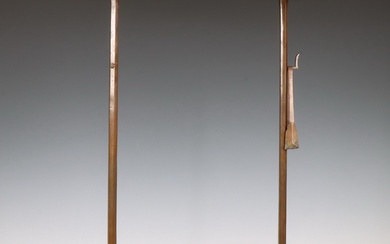 Japan, a pair of brown patinated bronze altar candlesticks, Meiji period (1868-1912)