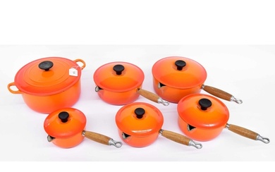 Le Creuset - graduated set of five pans with lids, colour fl...