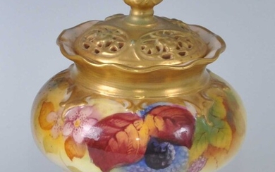 A George VI Royal Worcester porcelain blush ivory footed pot pourri jar and cover