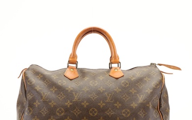 Louis Vuitton Speedy Handbag in Brown Monogram Coated Canvas