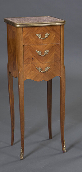 Louis XV-Louis XVI Transition style side table, France, 19th century. Three drawers in the front, marble veined top. Gilded bronze applications and profiles. Measurements: 72x26x27,5 cm. Exit: 180uros. (29.949 Ptas.)