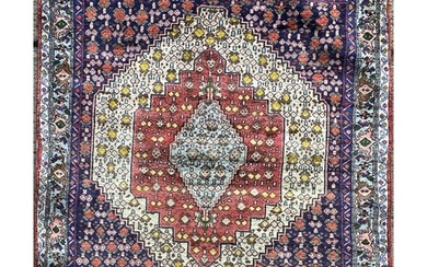 North West Persian Senneh rug, geometric medallion, multicol...