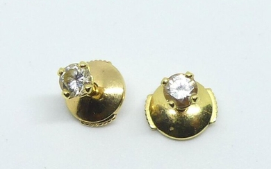 Pair of yellow gold earrings set with diamonds. Alpa.fastening system.Gross weight 1.6 g