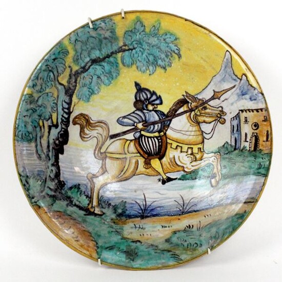 Piatto in ceramica Montelupo, decoro policromo raffigurante cavaliere, diametro cm....