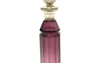 Purple Glass Decanter with a Silver Stopper.