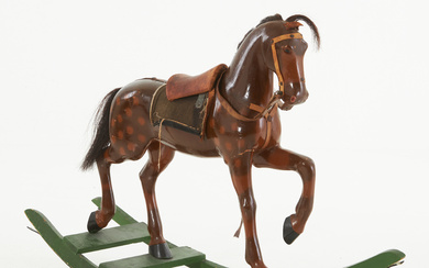 ROCKING HORSE, early 20th century, probably Gemla, painted wood, horsehair, leather saddle.