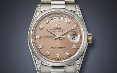 ROLEX, RARE PLATINUM AND DIAMOND-SET 'DAY-DATE' WITH SALMON DIAL, REF. 18296
