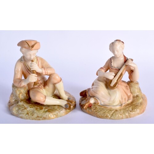 Royal Worcester blush ivory rare pair of figures of a boy an...