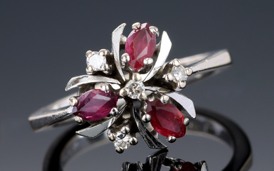 Ruby and diamond flower ring of 14 kt. white gold, total approx. 0.96 ct