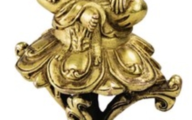 STATUETTE DE MARPA EN ALLIAGE DE CUIVRE DORÉ TIBET, XVIIIE SIÈCLE | 西藏 十八世紀 鎏金銅合金馬爾巴坐像 | A rare small gilt-copper alloy figure of Marpa, Tibet, 18th century