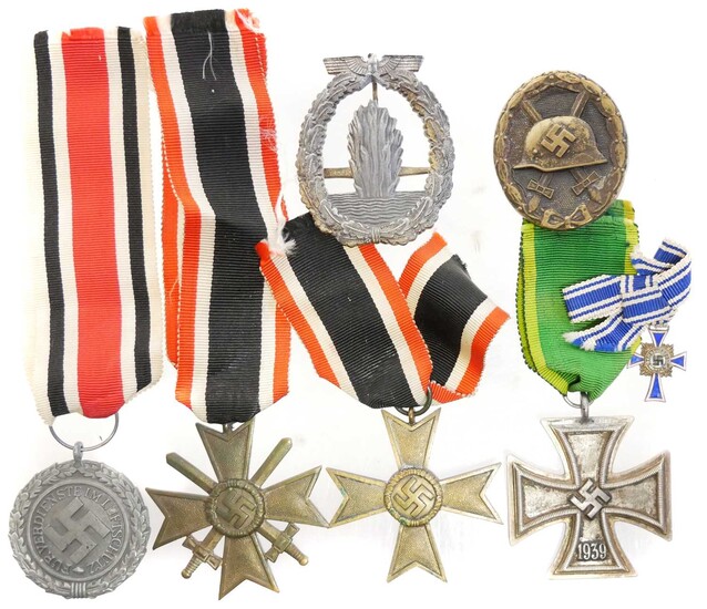 Seven German WWII medals / badges.