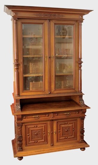 Showcase cabinet, German, Historism around 1900, walnut wood and walnut veneer on oak wood, two-door lower part with coffered doors and 2 drawers, doors flanked by pilasters, original locks and doors, original wooden frame fittings, keys available...