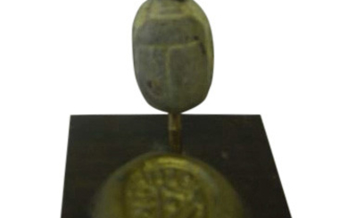 Soapstone scarab engraved with a Toutmosis III cartridge...
