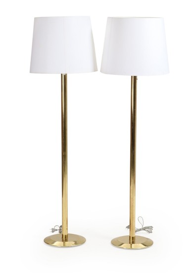 Swedish design: A pair of brass floor lamps mounted with white acryllic shades. Manufactured by Öresjö Industri, Sweden. H. incl. shade 168 cm. (2)