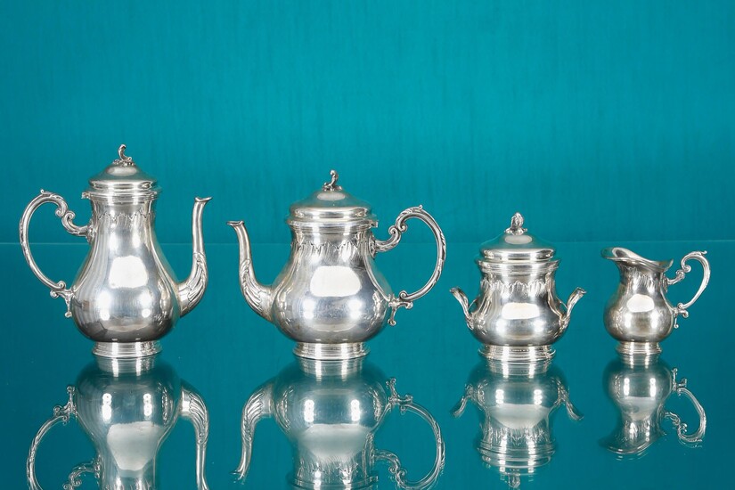 Tea service In silver (950‰) comprising 2 teapots, 1 sugar...