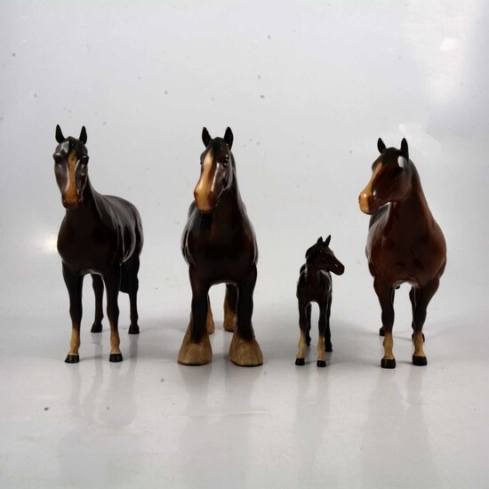 Three Beswick horses and a Royal Doulton foal.