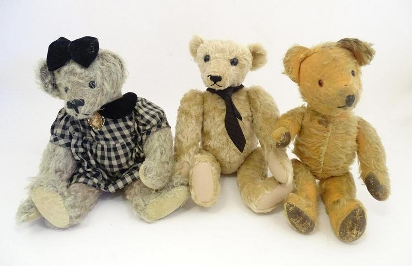 Toys: Three 20thC teddy bears with stitched noses, and