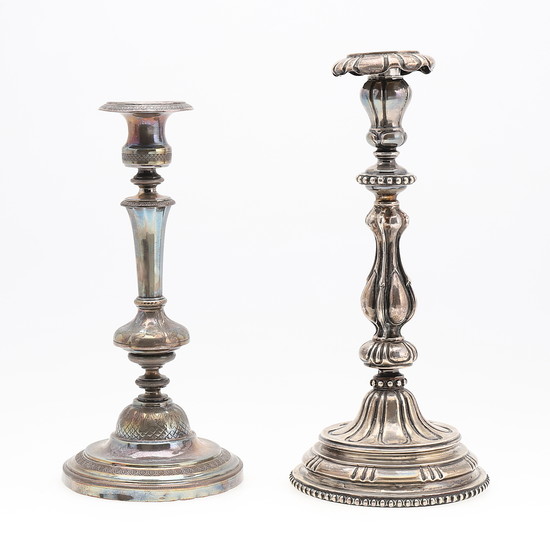 Two Barcelona silver candlesticks, 19th Century.