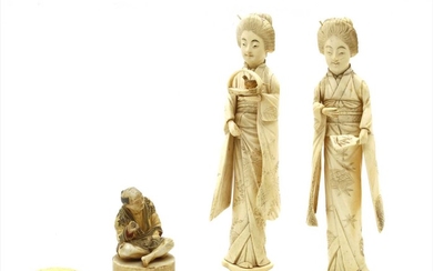 Two Japanese carved ivory female figures