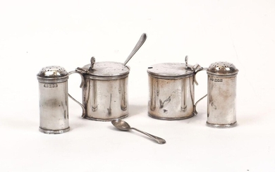 Two pairs of Edwardian silver cruets, the peppers c.1908, Elkington & Co., the blue glass-lined mustards Birmingham, c.1909, same maker, all with reeded banding and the initial 'Y' engraved to body or lid, the mustards with shell thumbpieces to...