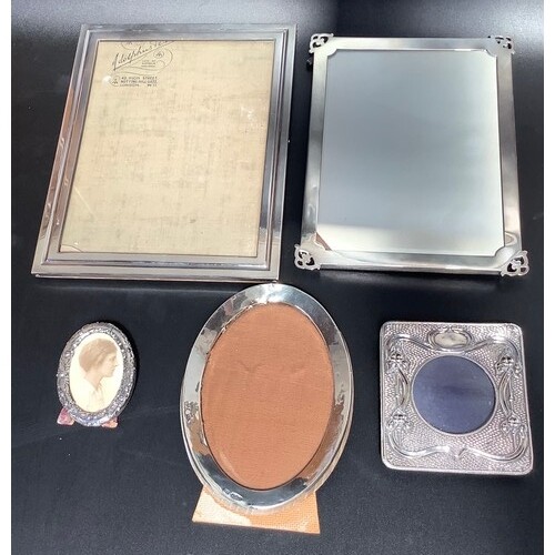 Two various rectangular silver photograph frames, an Art Nou...