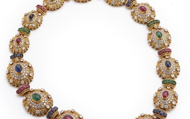 Van Cleef & Arpels: A diamond necklace set with cabochon and cicular-cut rubies, sapphires, emeralds and brilliant-cut diamonds, mounted in 18k gold. Ca. 1960.