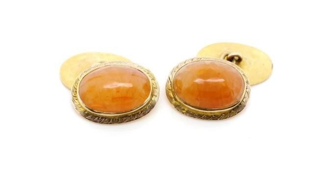 Yellow gold and carnelian cufflinks with oxford oval shields...