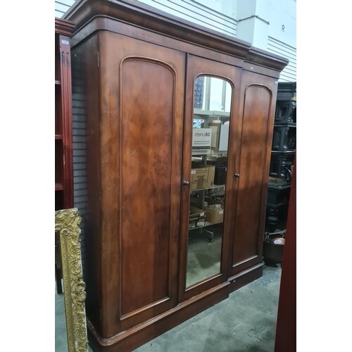 19th century mahogany compactum, the moulded cornice above t...