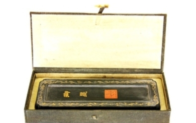 A boxed Chinese calligraphers hand painted ink block, L. 24cm.