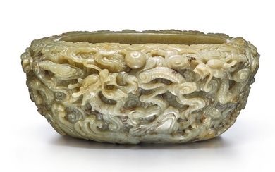A LARGE CELADON AND RUSSET JADE 'DRAGON' WASHER EARLY QING DYNASTY
