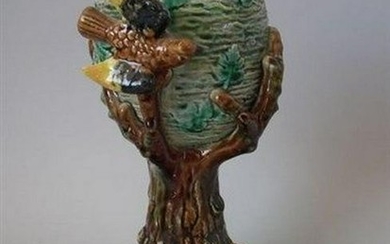 Majolica birds with nest in tree vase