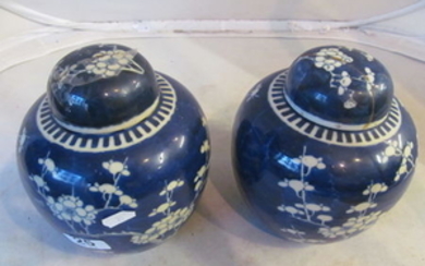 A pair of oriental ginger jars prunus blossom and other modern oriental blue and white china.