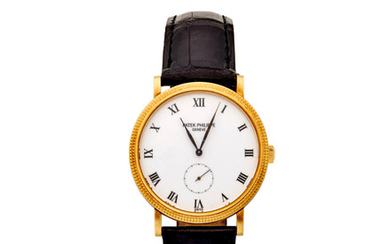Patek Philippe. An 18K gold wristwatch