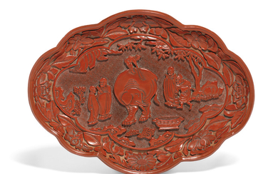 A RARE AND FINELY CARVED LOBED CINNABAR LACQUER 'WASHING THE ELEPHANT' DISH, JIAJING SIX-CHARACTER INCISED MARK AND OF THE PERIOD (1522 - 1566)