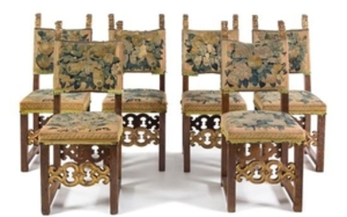 * A Set of Six Italian Baroque Parcel Gilt Walnut Side Chairs