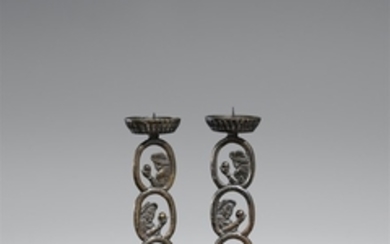 Two nanban bronze candle sticks. 19th century