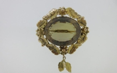 A Victorian smoky citrine brooch with foliate and