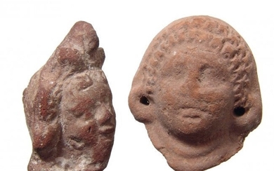 A pair of nice Egyptian terracotta heads, Roman Period
