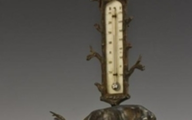 A 19th century cast iron table thermometer, as a stag
