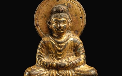 A RARE EARLY GANDHARAN-STYLE GILT-BRONZE VOTIVE FIGURE OF SHAKYAMUNI BUDDHA SIXTEEN KINGDOMS, 4TH – EARLY 5TH CENTURY