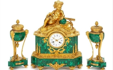 A French Gilt Bronze And Malachite Clock Garniture