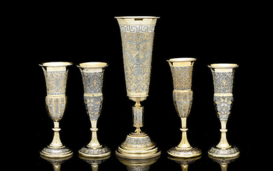 A group of five silver-gilt and niello flutes